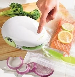 Frisper Freshkeeper Vacuum Food Sealere — Kitchen Helper item WK0068 from Winifer
