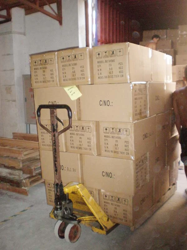 Cartons on a pallet truck inside the Weymic warehouse