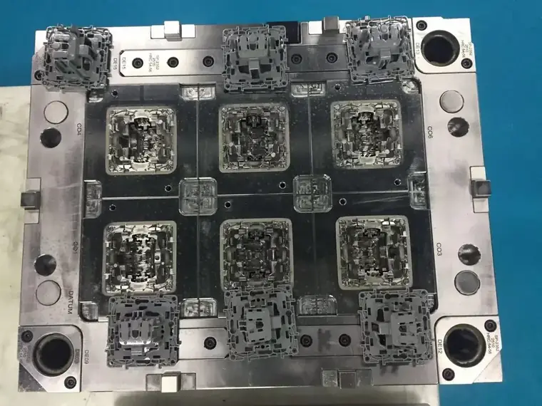 Large multi-cavity injection mould plate machined and assembled in the tool room