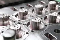 Polished multi-cavity mould inserts before assembly into the mould base