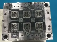 Large multi-cavity injection mould plate machined and assembled in the tool room