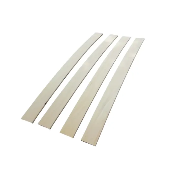 Birch bed slats stacked showing the laminated veneer edges