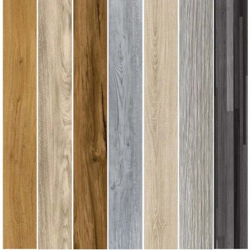 LVT flooring planks in several wood decors arranged side by side