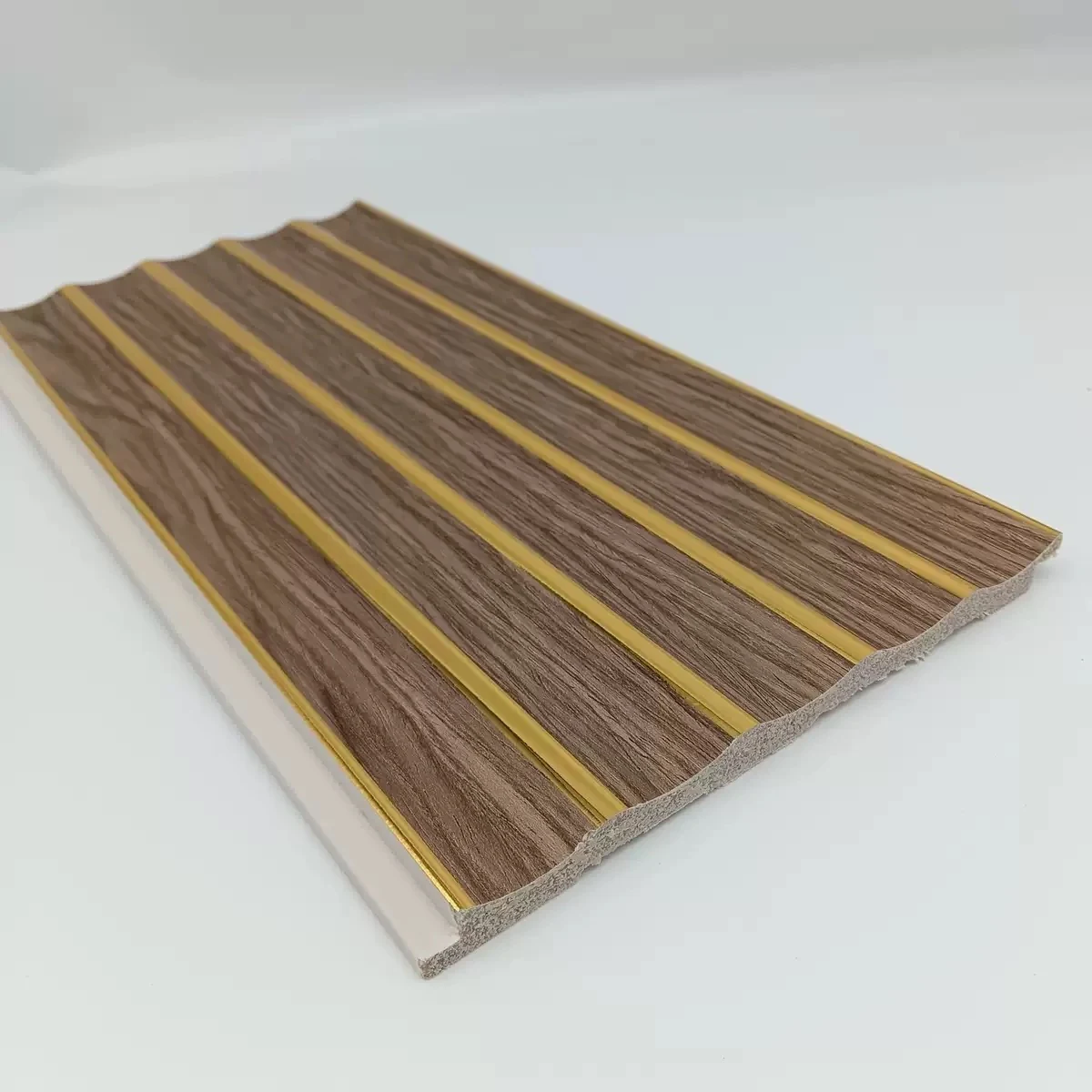 PS 3D wall panel with woodgrain fluting and gold trim strips
