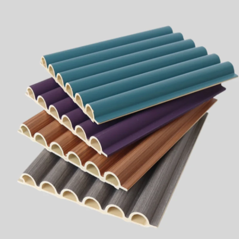 WPC interior wall panels stacked showing the 160mm module and veneer finish
