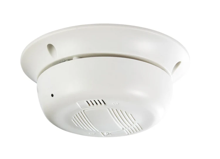 Smoke Detector Style WiFi Camera WF-720SMK shown in a room setting