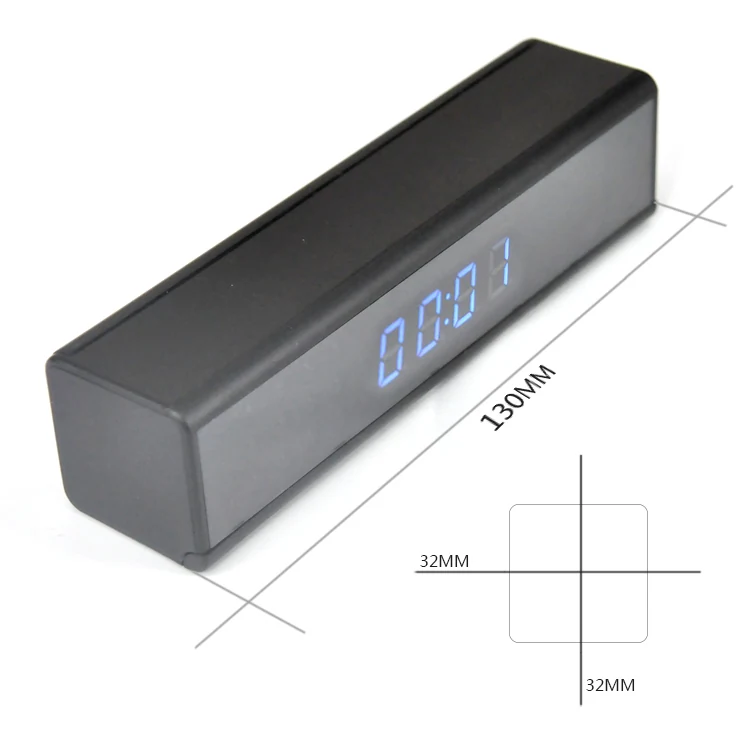 Mini WiFi Alarm Clock Camera WF-1080DTC shown in a room setting