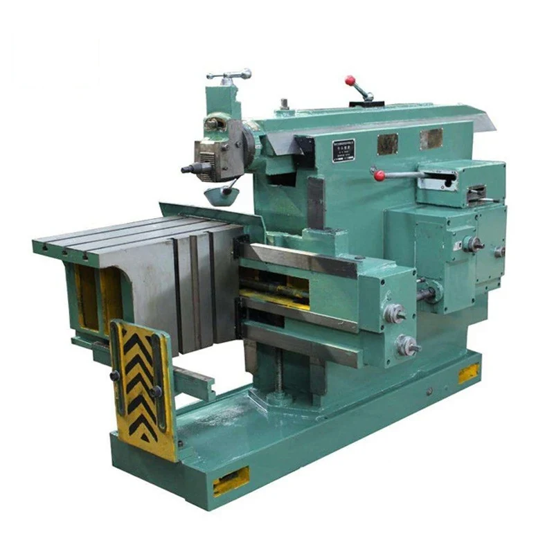 BC6063 horizontal metal shaper machine showing the reciprocating ram tool post and swivelling worktable on a cast base