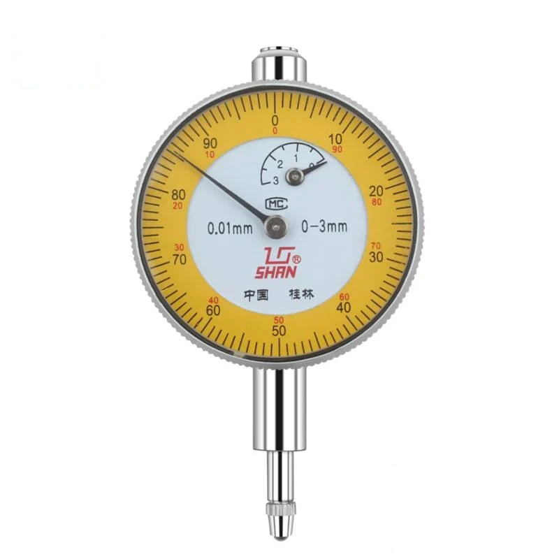 Dial bore gauge with dial indicator mounted on a long stem gauge body shown with a set of interchangeable anvils