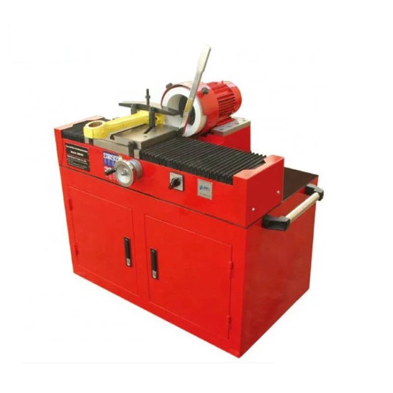 DM100 cap and rod grinding machine with grinding wheel head work clamp and control handwheel on a bench-height base