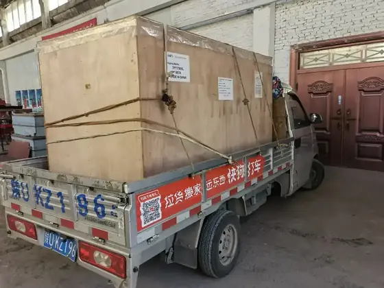 A crated machine loaded for the port. Machines are crated for sea freight and consolidated so a full line arri