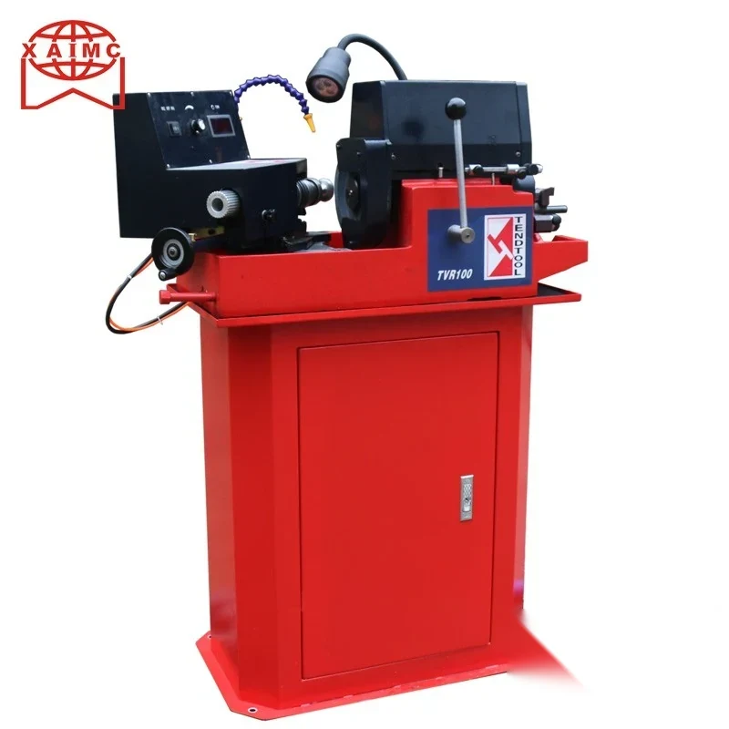 TVR100 valve grinder with horizontal chuck head grinding wheel guard and control panel on a floor-standing cabinet base
