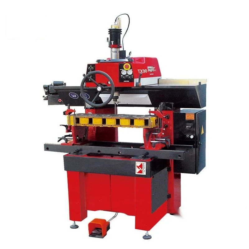 TX90 valve seat boring machine with air-float centring work head control panel and pneumatically locked table bars