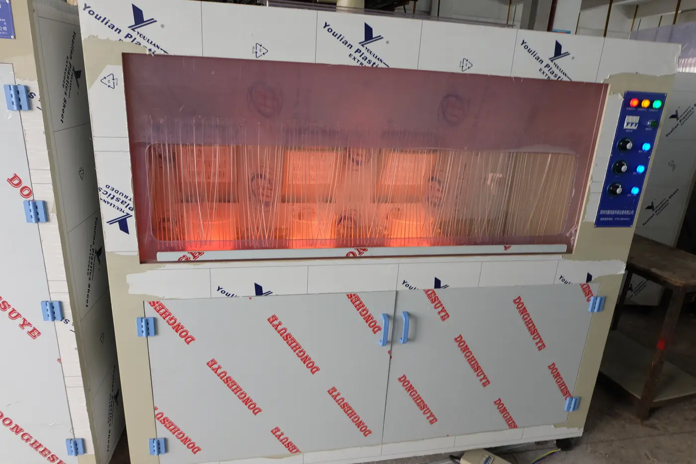 Automatic Safe Acid Burning and Color Hanging Cabinet loading arrangement