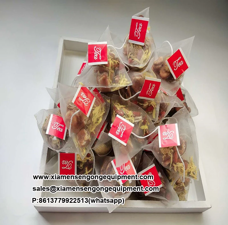 C20 pyramid tea bag machine in operation with film unwinding and bag forming