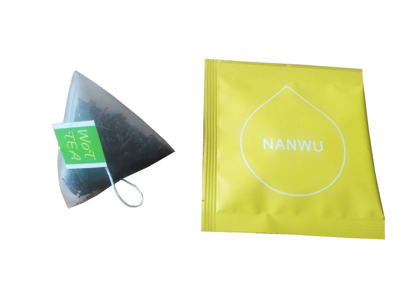 Double-layered pyramid tea bags with visible whole leaf produced on the C28DX machine