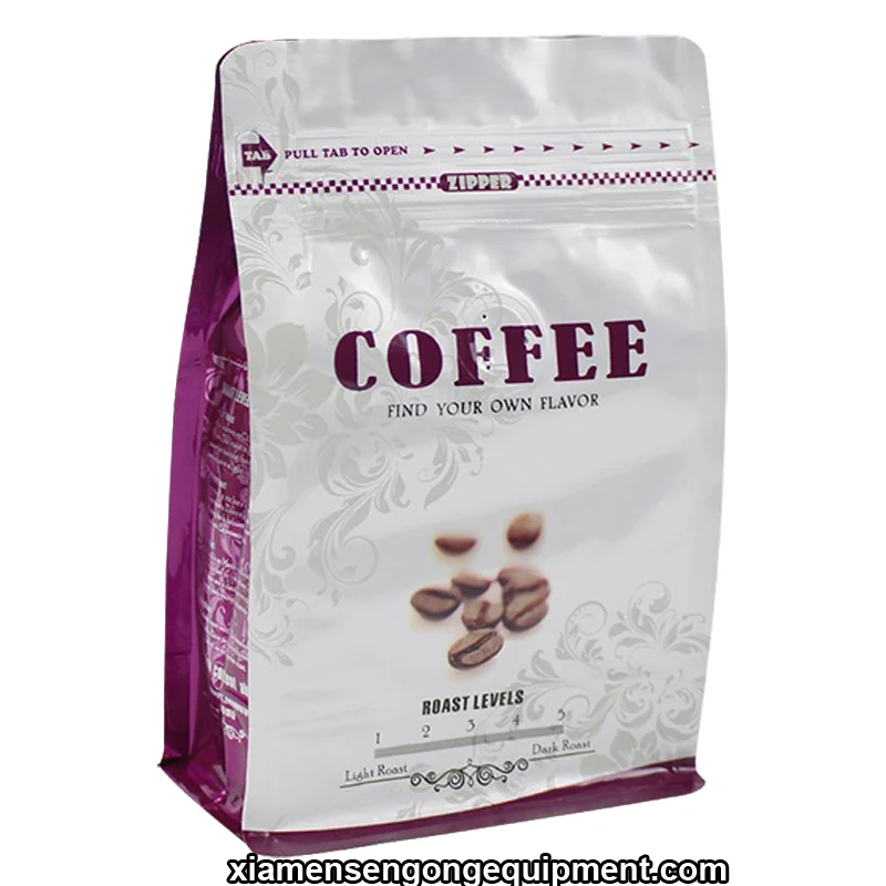 Vacuum-sealed coffee bean bags with visible whole beans produced on the C500Z machine