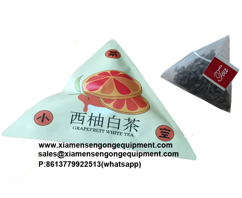 Triangle tea bags with visible whole leaf and string produced on the C88DX machine