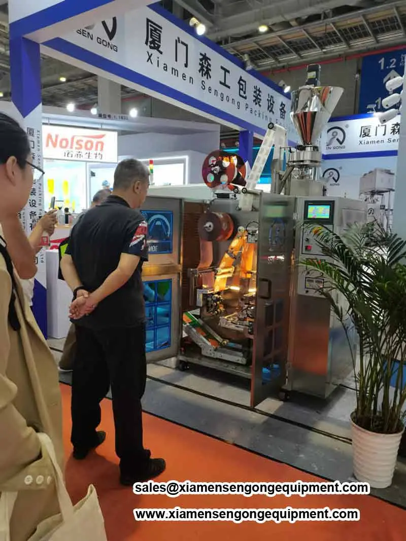 Drip coffee bag packing machine shown at a Sengong exhibition stand
