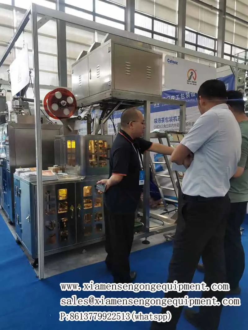 Sengong engineer running a tea bag packing machine before shipment