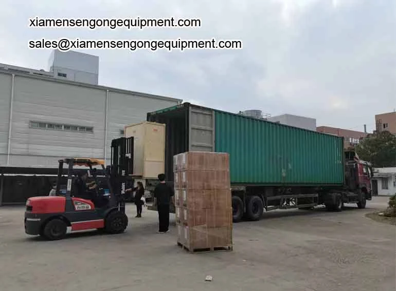Sengong machines at Delivery one 40ft pyramid tea bag packing machien to South Africa