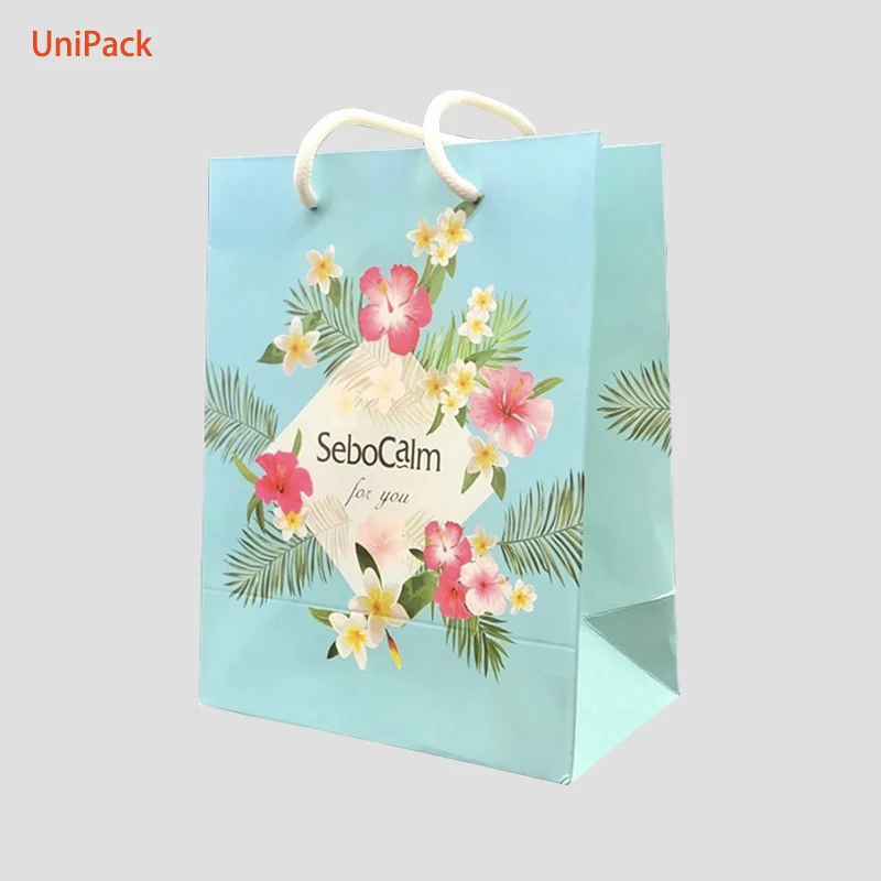 Color printed white kraft paper retail bag with foil stamped logo