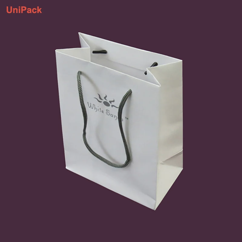 Custom printed paper retail bag on white art paper with handles