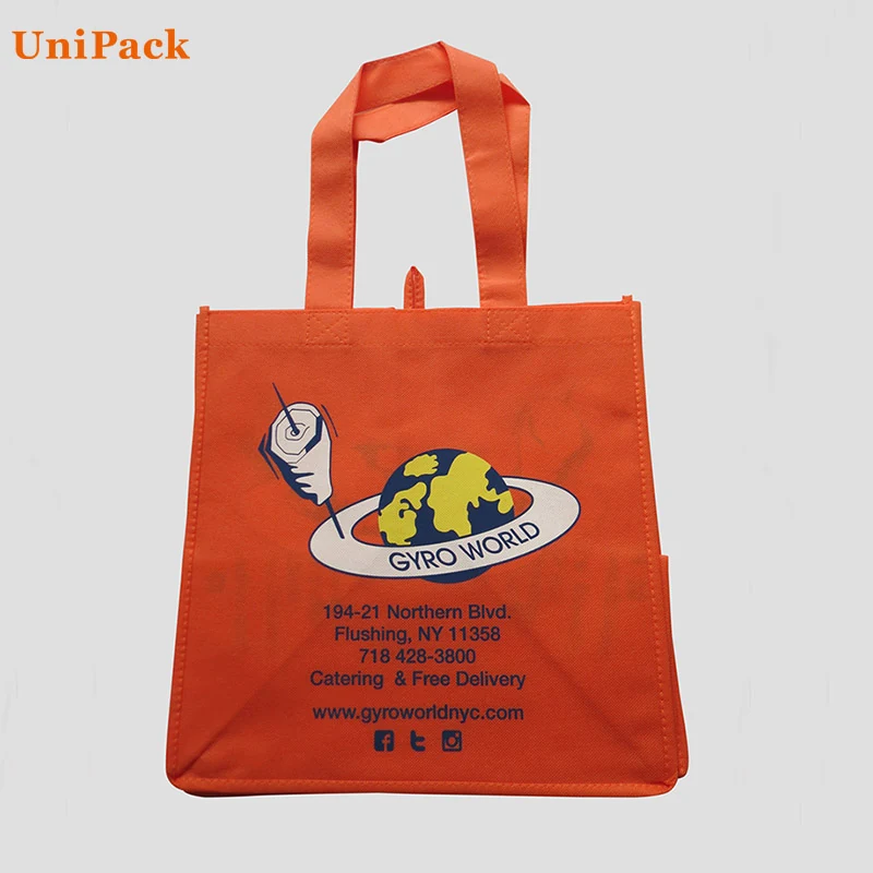 Coloured nonwoven shop bags with custom logo printing in a carton