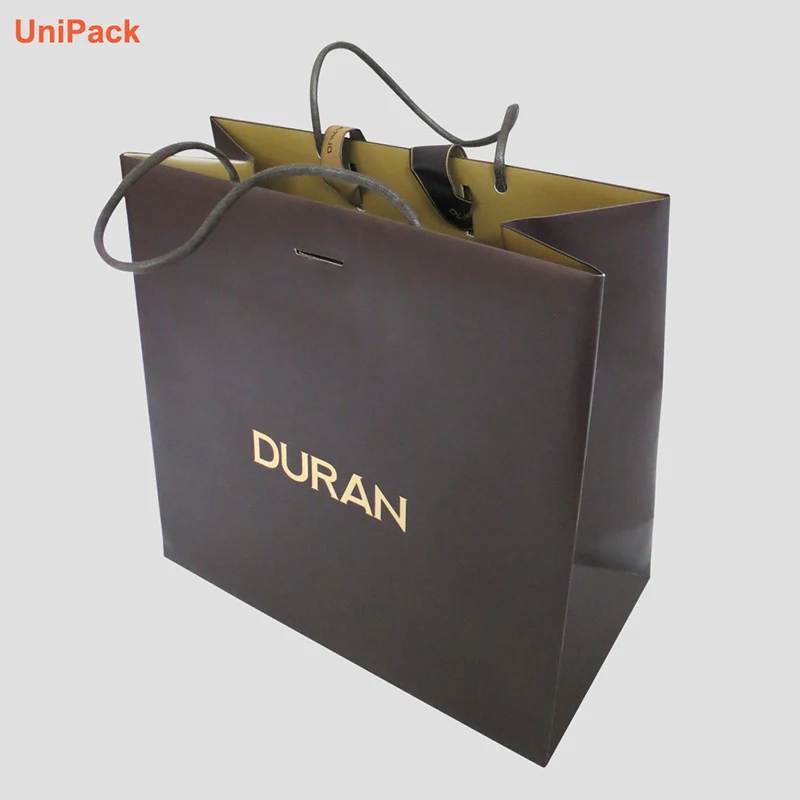 Customized paper shopping bag in white art card with printed logo