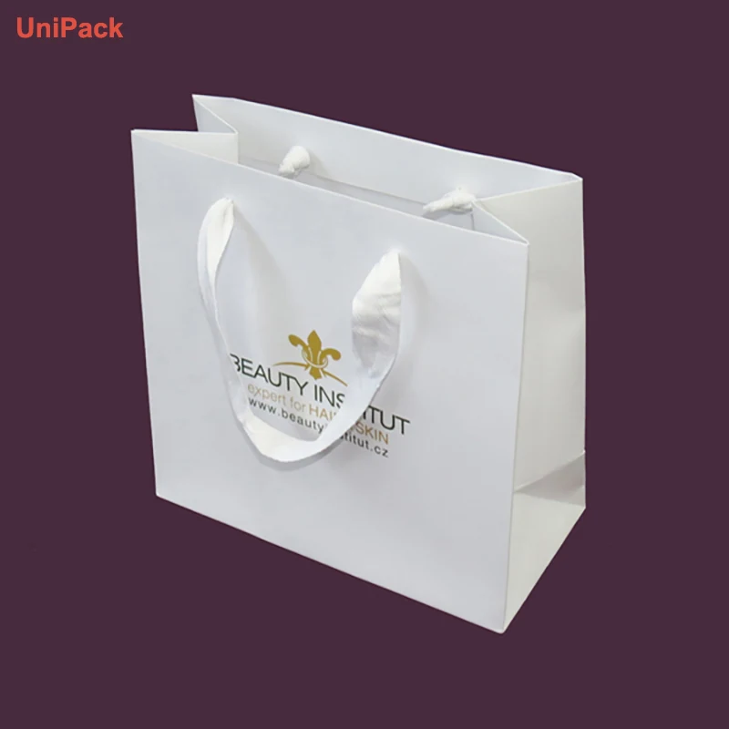 Customized paper retail bag in white art paper with colour printing