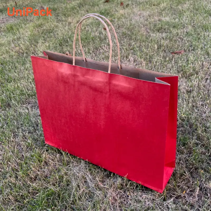 Brown kraft takeaway bag 35x8x25cm with paper twisted handles