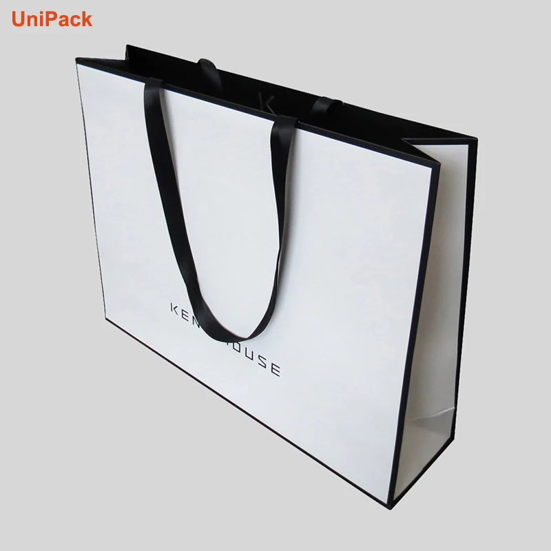 Custom printed white kraft luxury paper shopbag with foil stamped logo and ribbon handles