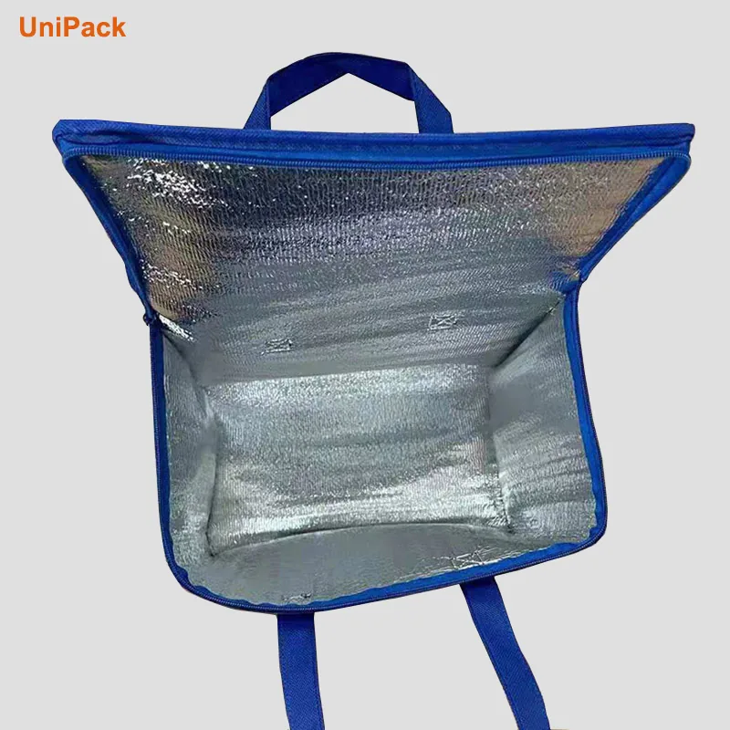 Portable travel cooler bag in nonwoven fabric with aluminium lined interior, view 2