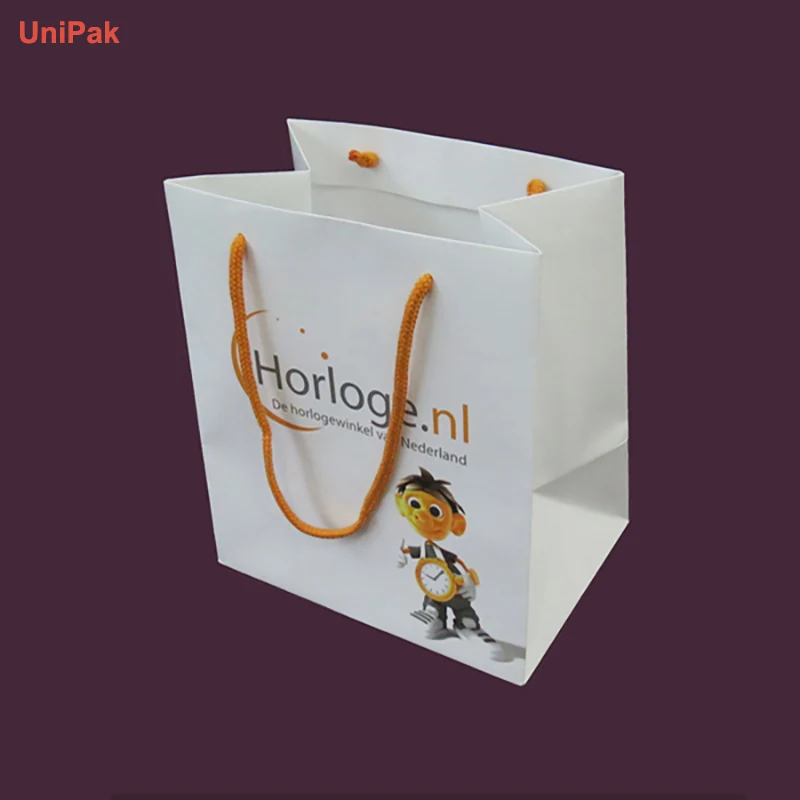 Customized white art paper retail bags in several sizes with matching print