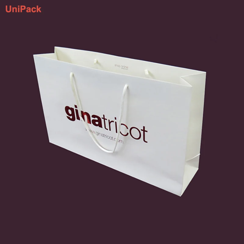 Made to order white art paper retail bag in a non-standard size