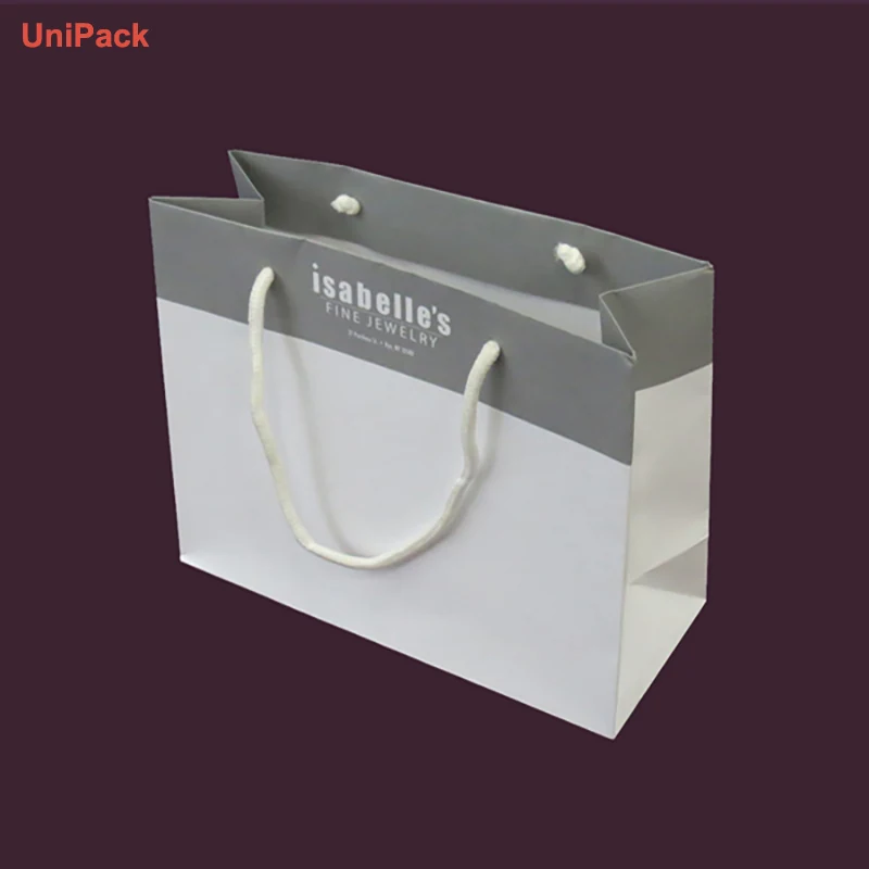 White kraft paper retail bag with custom printed branding