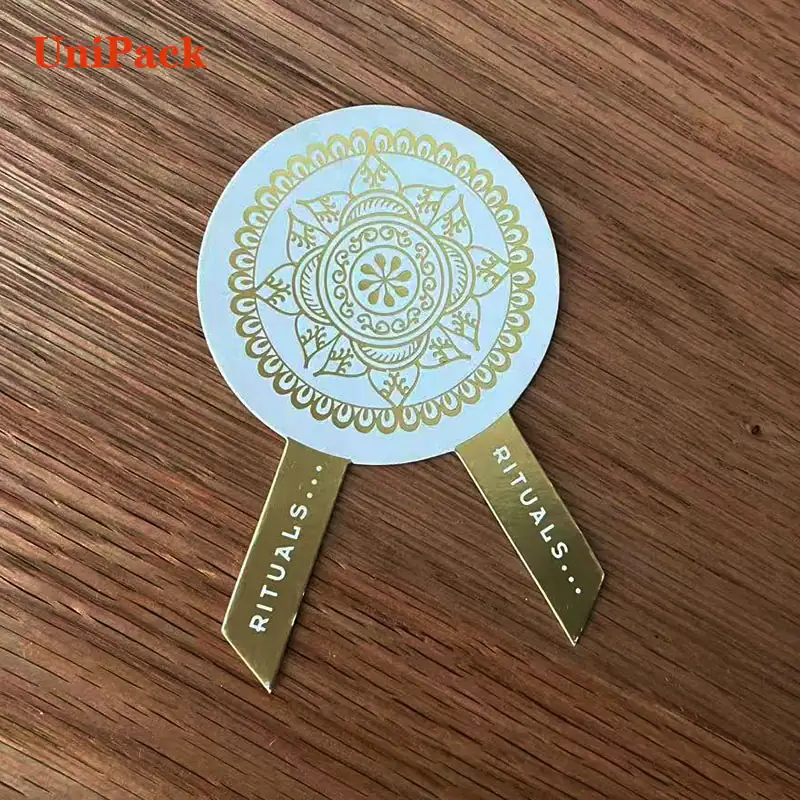 Custom art card paper tag with gold foil stamped logo and string