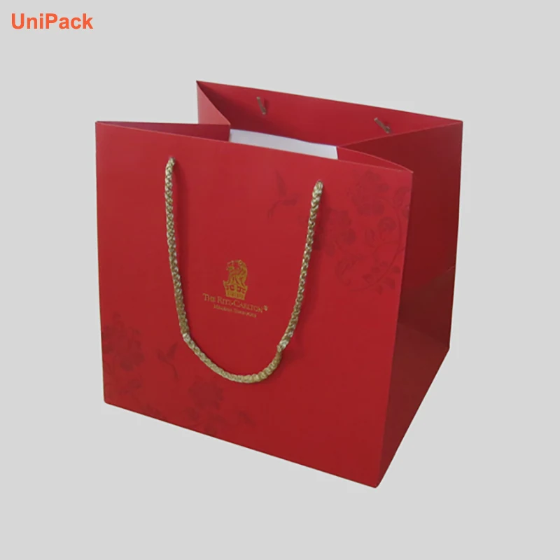 White art card paper shopping bag printed in custom brand colours