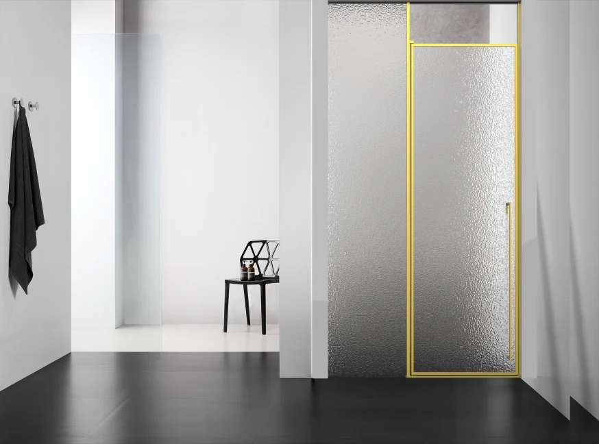 Xinxin 85P21 brushed gold frame in-line sliding door shown installed in a bathroom