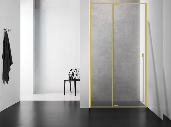 Xinxin 86P21 brushed gold frame in-line sliding door shown installed in a bathroom
