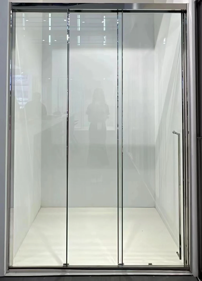 Xinxin 89P32 polished chrome-finish frame in-line sliding door shown installed in a bathroom