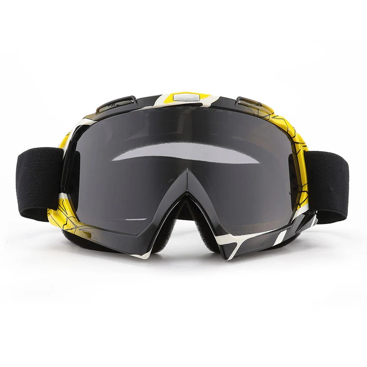 Close-up of the MT-Y634 goggle lens showing anti-glare and anti-scratch surface treatment