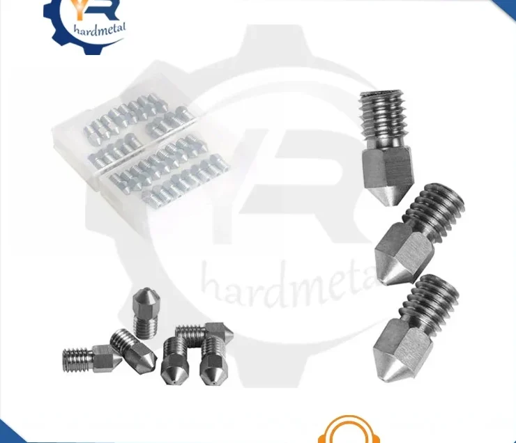 Threaded metal 3D printer nozzles with pointed tips, shown loose, in a pile, and stored in a plastic case