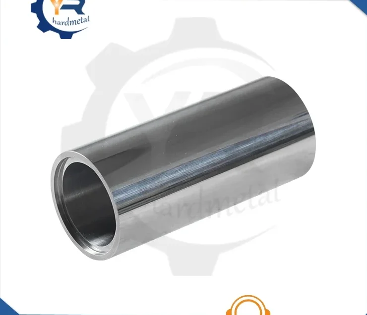 Polished cylindrical metal bushing with hollow bore, photographed on a white background
