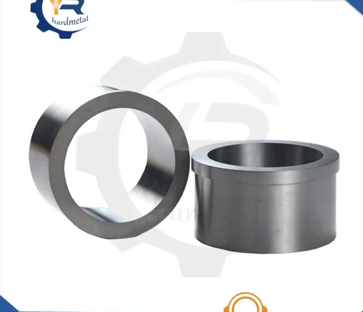 Two polished tungsten carbide bushing rings of different sizes on a white background