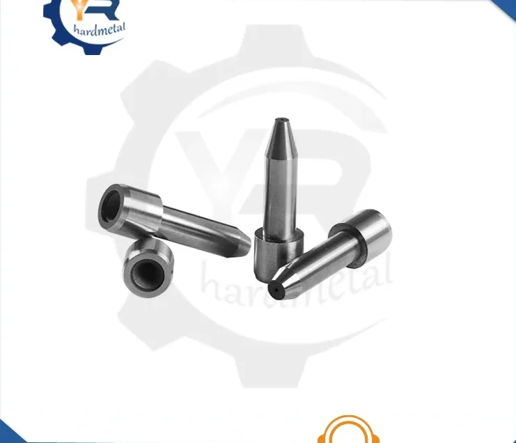 Tungsten carbide nozzles with tapered tips and cylindrical bodies arranged on a white background