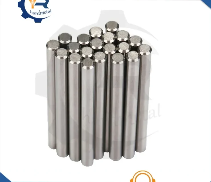 Bundle of shiny silver-gray metal rods standing upright on a plain white background