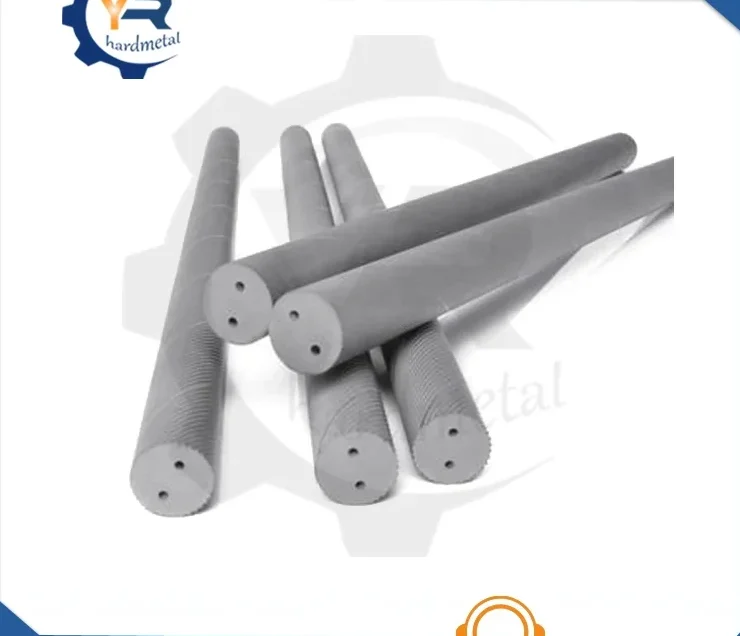 Gray tungsten carbide rods with helical coolant holes, ends facing viewer, on white background