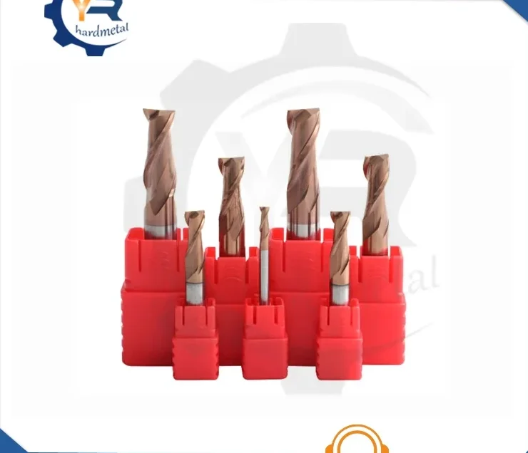 Set of carbide end mills standing upright in red plastic tool holders