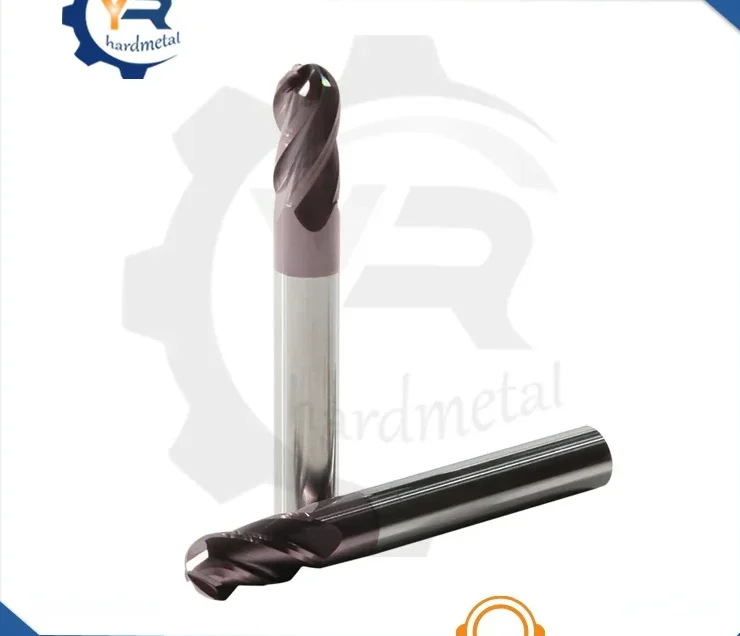 Two tungsten carbide ball nose end mills standing and lying on a white background